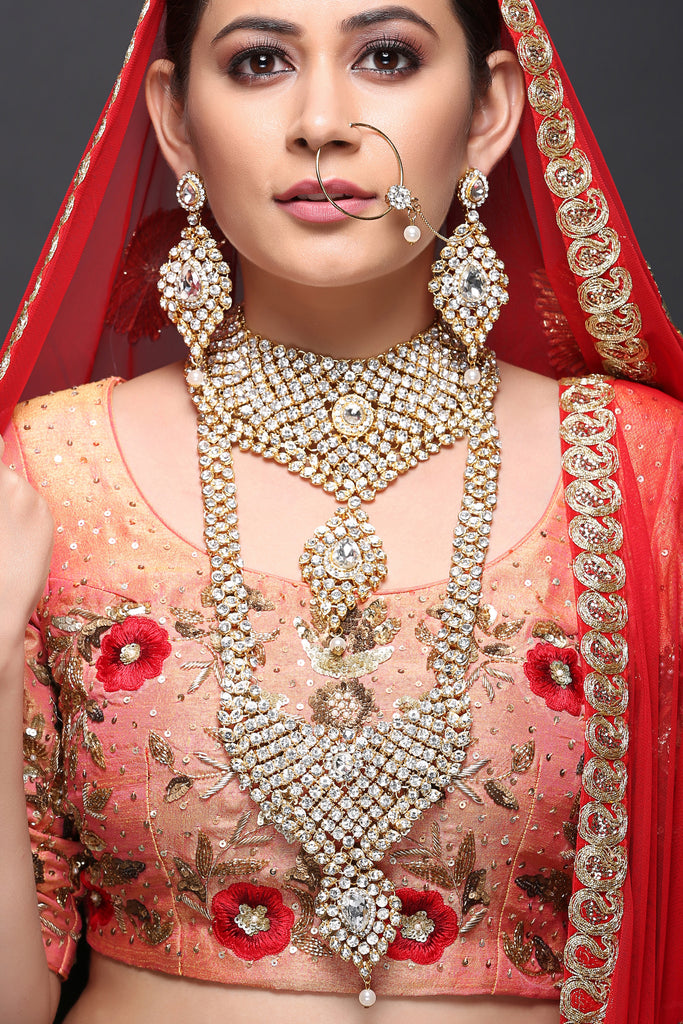 Bridal jewellery on sale on red lehenga