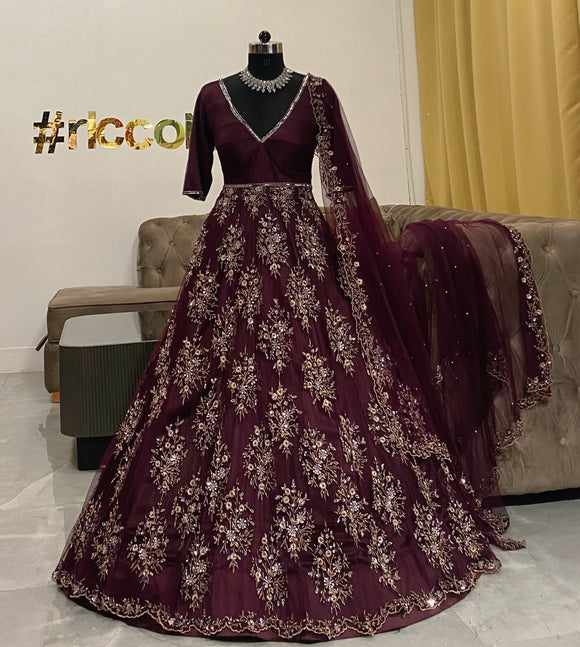 Wine Couture gown with silver beadwork