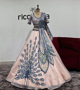 PEACH LEHENGA WITH PEACOCK DRAPE