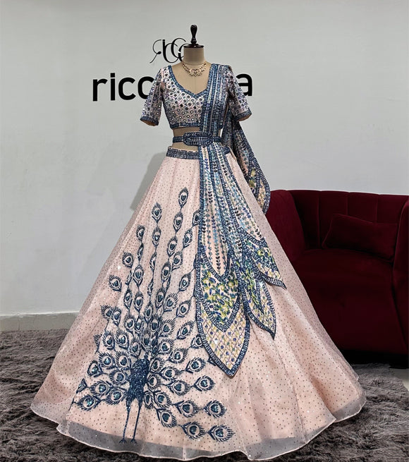 PEACH LEHENGA WITH PEACOCK DRAPE