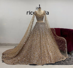 CHAMPAGNE GOLD OMBRE EMBROIDERY FLARED LEHENGA WITH CAPES