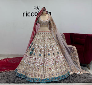 WHITE BRIDAL LEHENGA WITH TURQUOISE & RED BEADS