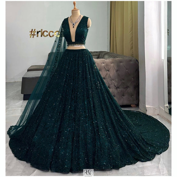 EMERALD GREEN SPARKLE TRAIN LEHENGA WITH PLUNGE NECKLINE TOP