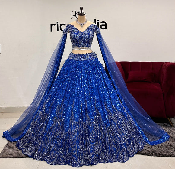 ROYAL BLUE HEAVY FLARED LEHENGA WITH CAPES