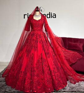 BRIGHT RED ANARKALI GOWN WITH SWAROVSKI WORK