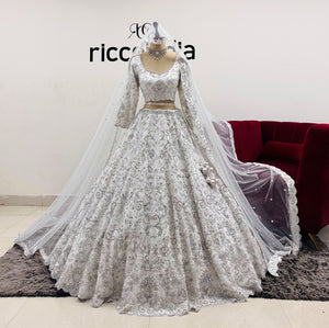 WHITE BRIDAL LEHENGA WITH SILVER EMBROIDERY