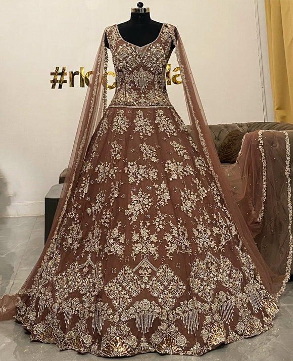 Rosegold gown with shoulder capes
