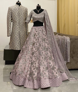 Lavender lehenga and sherwani set