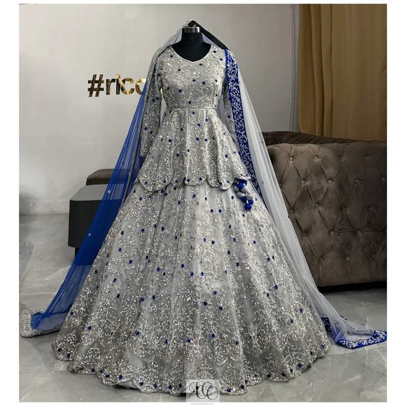 SILVER & BLUE PEPLUM LEHENGA WITH CAPES