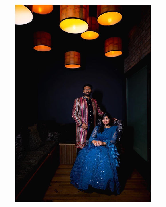 Teal Lehenga with feather dupatta