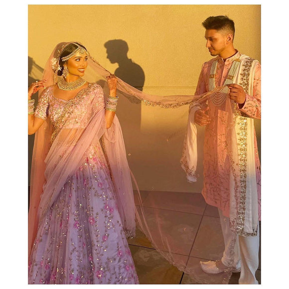 Custom outfit for bride and groom