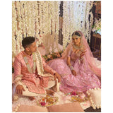 Custom outfit for bride and groom