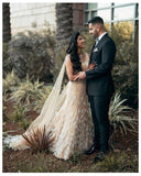 Mermaid trail gown with feathers and shoulder capes