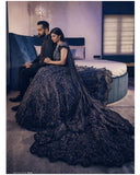 Charcoal blue train gown with shoulder cape