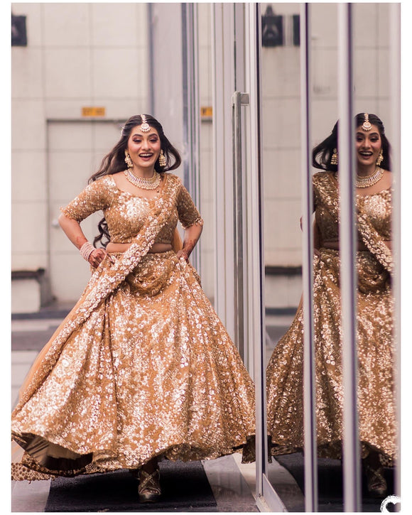 Gold lehenga Ricco India