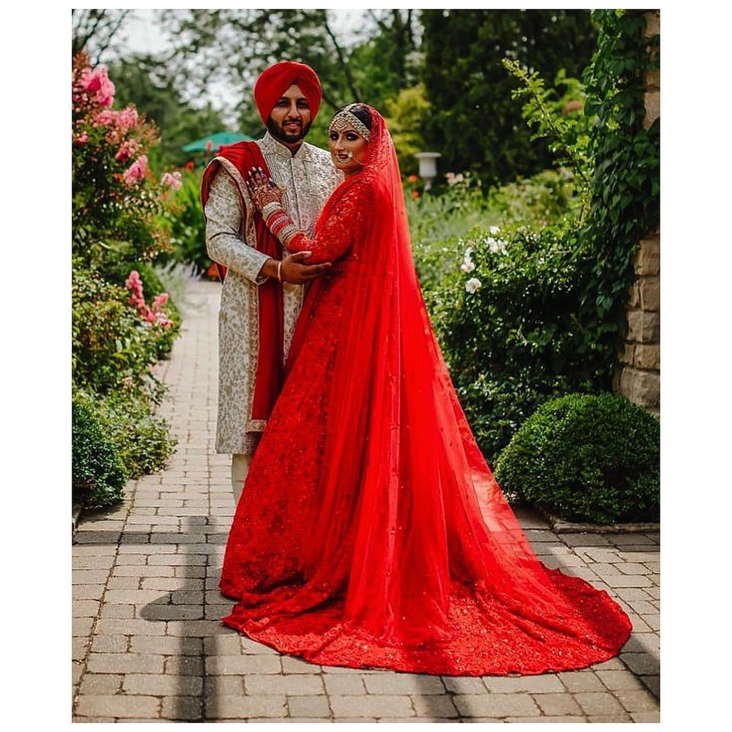 Red Anarkali gown with trail – Ricco India