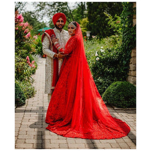 Red Anarkali gown with trail