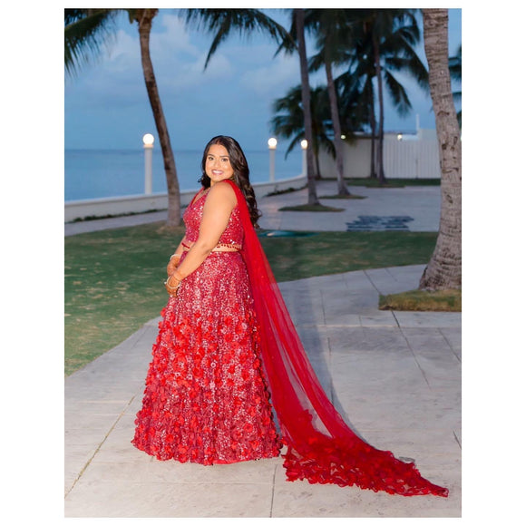 Red flowery lehenga with capes