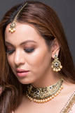 Gold necklace with black stones and pearls