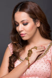 AD & CZ Haath Phool In Red & Gold
