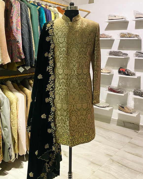 Green brocade sherwani with green velvet shawl