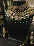 Pure polki necklace with emerald stones