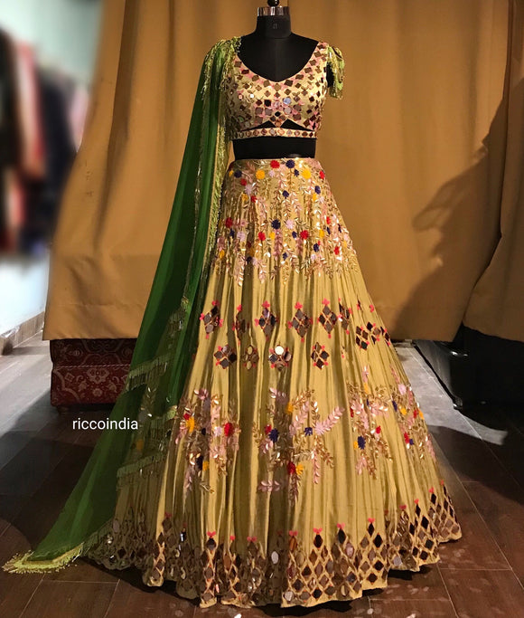 Green mirrorwork and colorful sequins lehenga with tassel dupatta