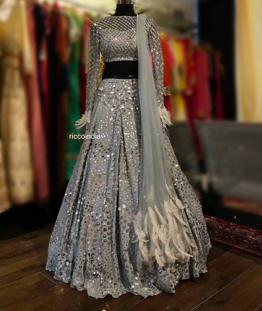 Silver Lehenga with intricate sequin work and feather detailing – Ricco ...