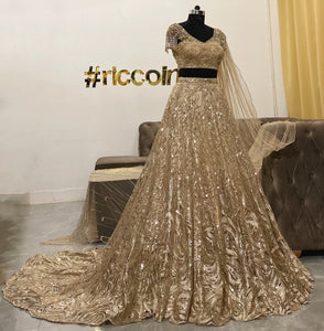 Champagne gold train lehenga