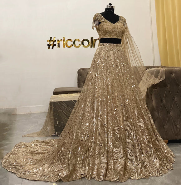 Champagne gold train lehenga