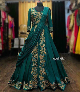 Green draped sareegown with dori work