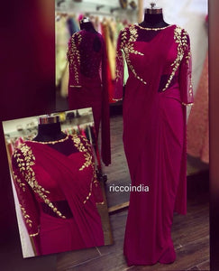 Wine draped sareegown with intricate pearl and dabka work