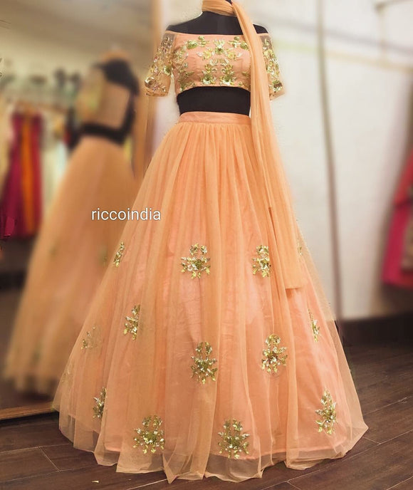 Peach off shoulder Lehenga with sequin work