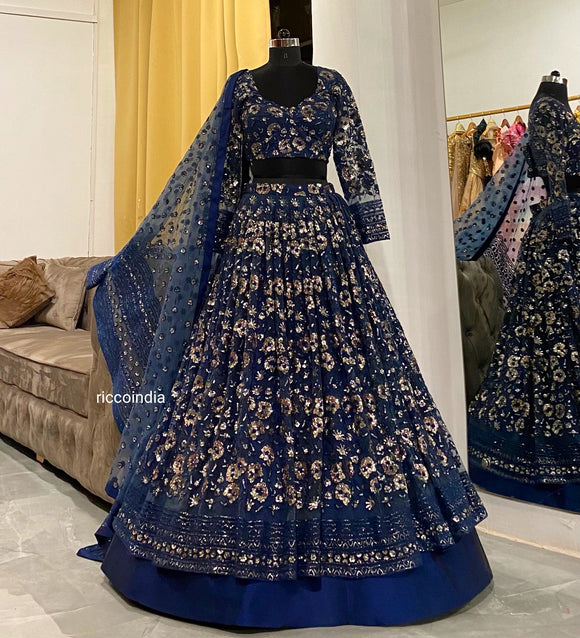 Dark blue lehenga with rose gold embroidery