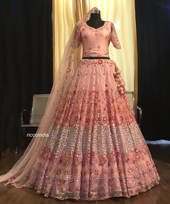 Pink heavy flare bridal lehenga with gota and Resham embroidery