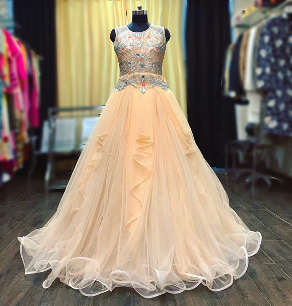 Peach flared cocktail gown with crystal work