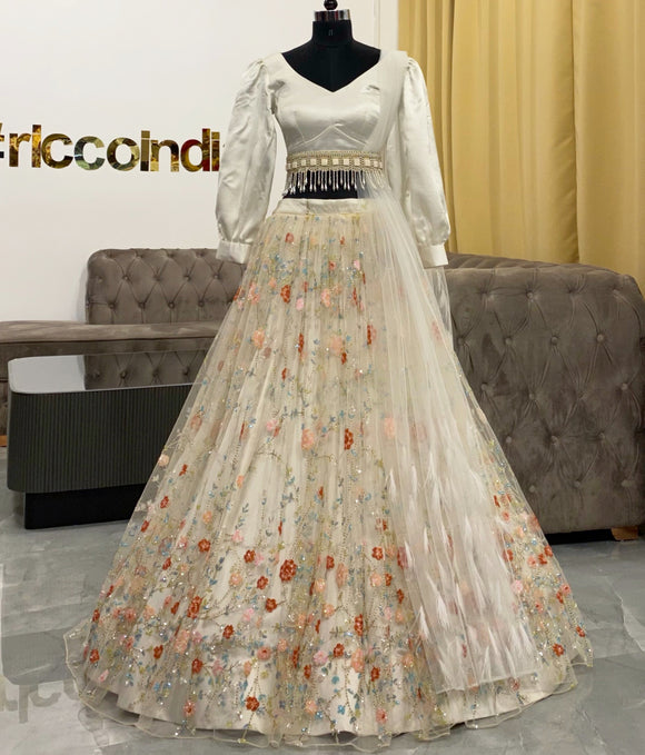 White lehenga with  colorful beadwork