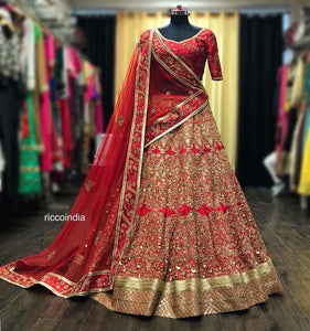 Red intricate sequin work bridal Lehenga with two dupattas