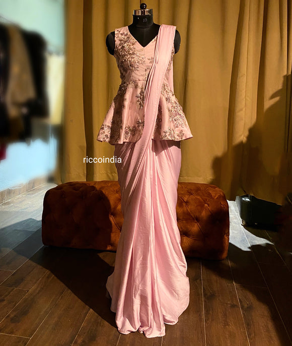 Beautiful crepe-satin draped dress in Saree style. Embellished with hand  embroidery. #dress #… | Gown dress design, Designer saree blouse patterns,  Stylish sarees