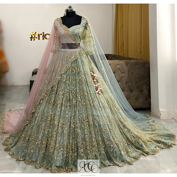 Mint green jaal embroidery train lehenga with baby pink dupatta