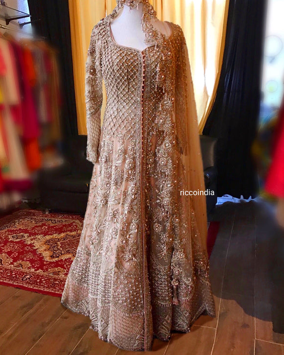 Intricate embroidery jacket Lehenga in champagne gold