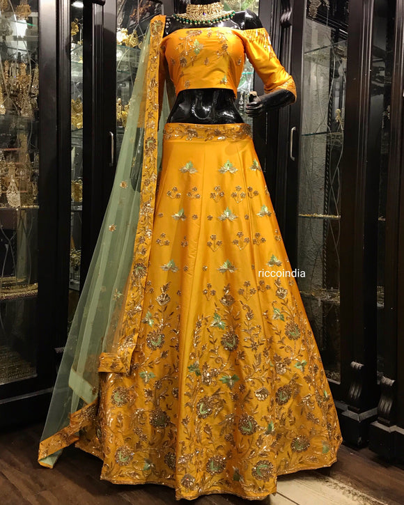 Mustard and mint green heavily beaded Lehenga