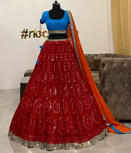Turquoise Pink and orange Lehenga with sequins and mirrors