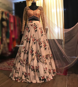 Peach Aztec embroidery blouse with floral layered lehenga