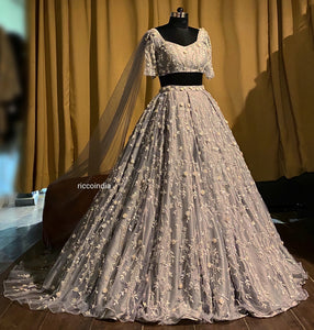 Grey train lehenga with shoulder drape cape dupatta