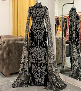 Couture suede black gown with cape sleeves