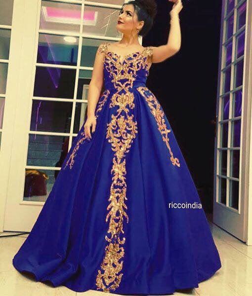 Blue cocktail gown with delicate gold stone work