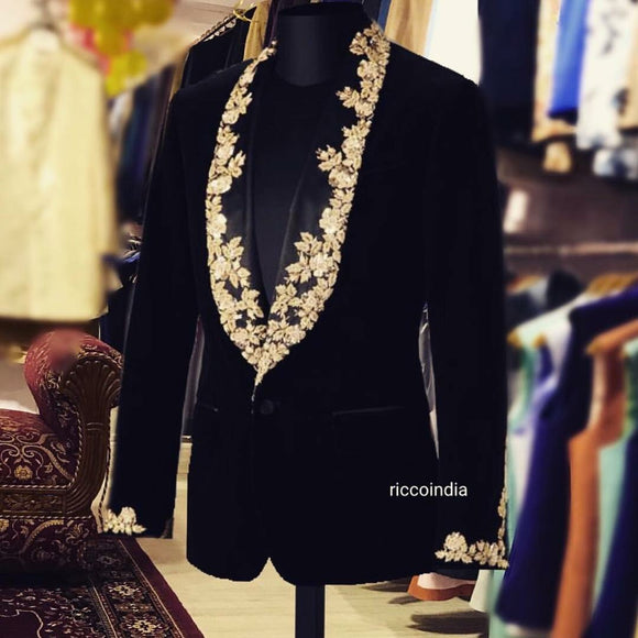 Black tuxedo with intricate embroidery lapel