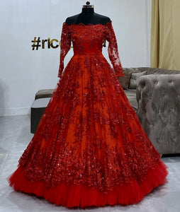 Off shoulder red layered gown with beading