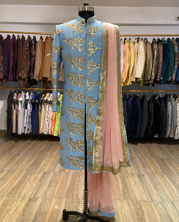 Baby blue sherwani with gold sequins work and shawl